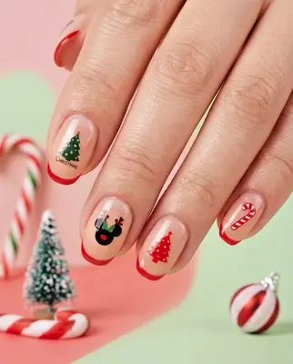 Weihnachtlich verzierte Fingernägel mit Weihnachtsbaum, Zuckerstange und Micky-Maus-Motiven in Rot, Grün und Schwarz