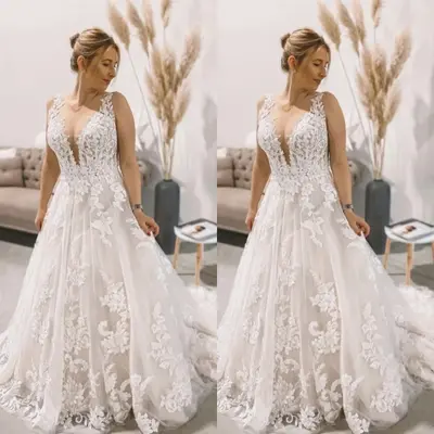 Boho Brautkleider Ärmellos V Ausschnitt Strand Spitze Sweep Schleppe Brautkleid