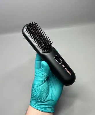 Kabellose Bürste Heißkamm Haar Locken und tragbares Glätteisen überall