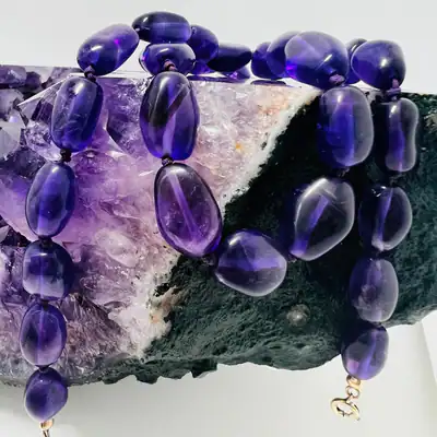 Vintage Amethyst Kette 54cm handgeknüpft ovale Edelsteinperlen lila Collier